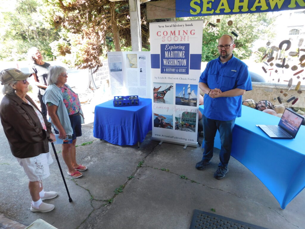 Erich giving an outdoor presentation on maritime history.